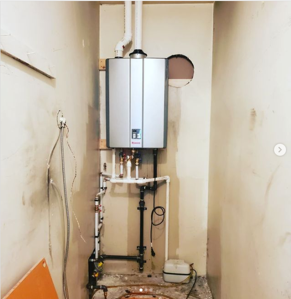 Tankless condensing gas water heater